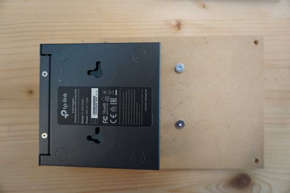 Simple wooden plate to attach the POE Switch using the wall-mount holes